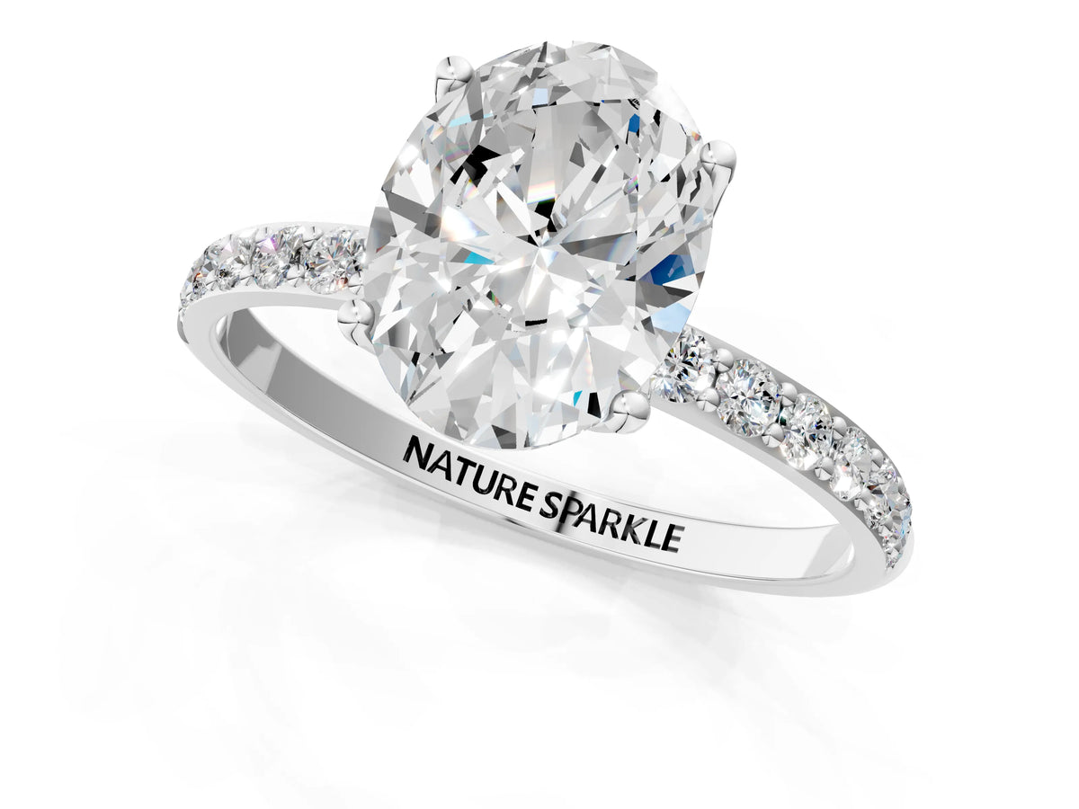 Oval Cut Diamond Solitaire Ring in Platinum with Round Shared Prong Pavé Band