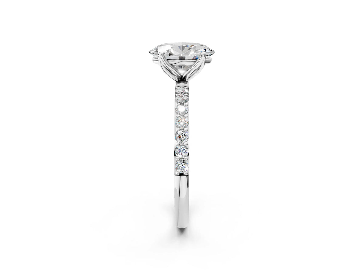 Oval Cut Diamond Solitaire Ring in Platinum with Round Shared Prong Pavé Band