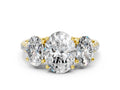Oval Cut Diamond Trellis Three-Stone Engagement Ring in Yellow gold with Round Side Stones