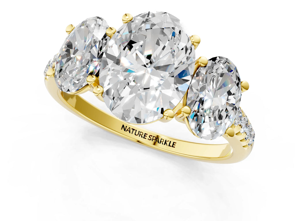 Oval Cut Diamond Trellis Three-Stone Engagement Ring in Yellow gold with Round Side Stones