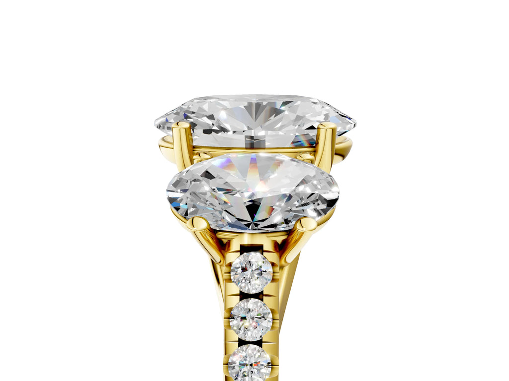 Oval Cut Diamond Trellis Three-Stone Engagement Ring in Yellow gold with Round Side Stones