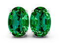 Oval Cut Emerald Stud Earrings in Silver with Basket Setting