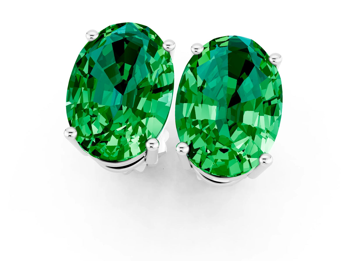 Oval Cut Emerald Stud Earrings in Silver with Basket Setting