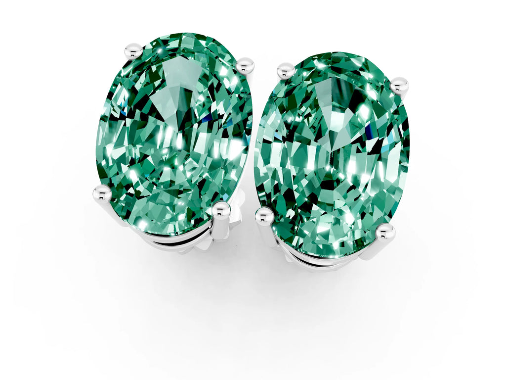 Oval Cut Green Sapphire Stud Earrings in Platinum with Basket Setting
