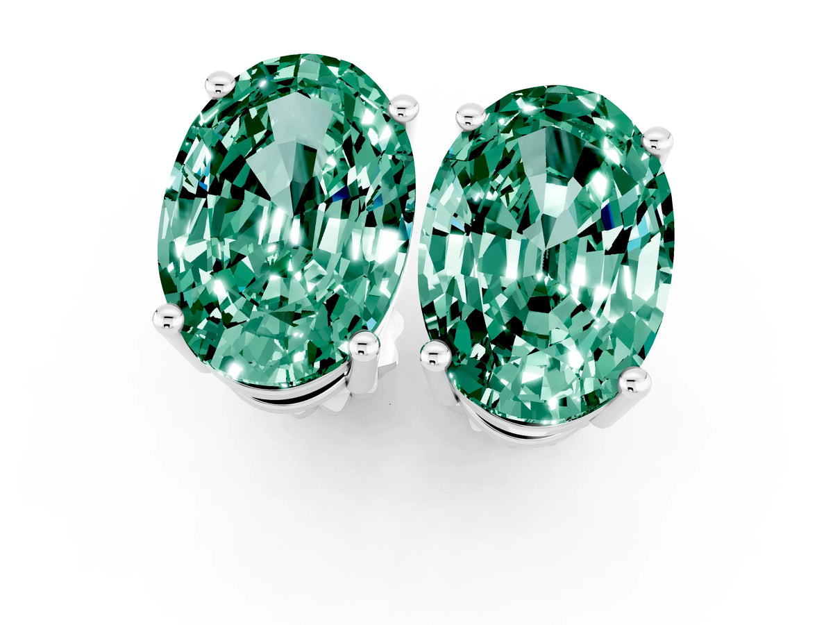Oval Cut Green Sapphire Stud Earrings in Platinum with Basket Setting