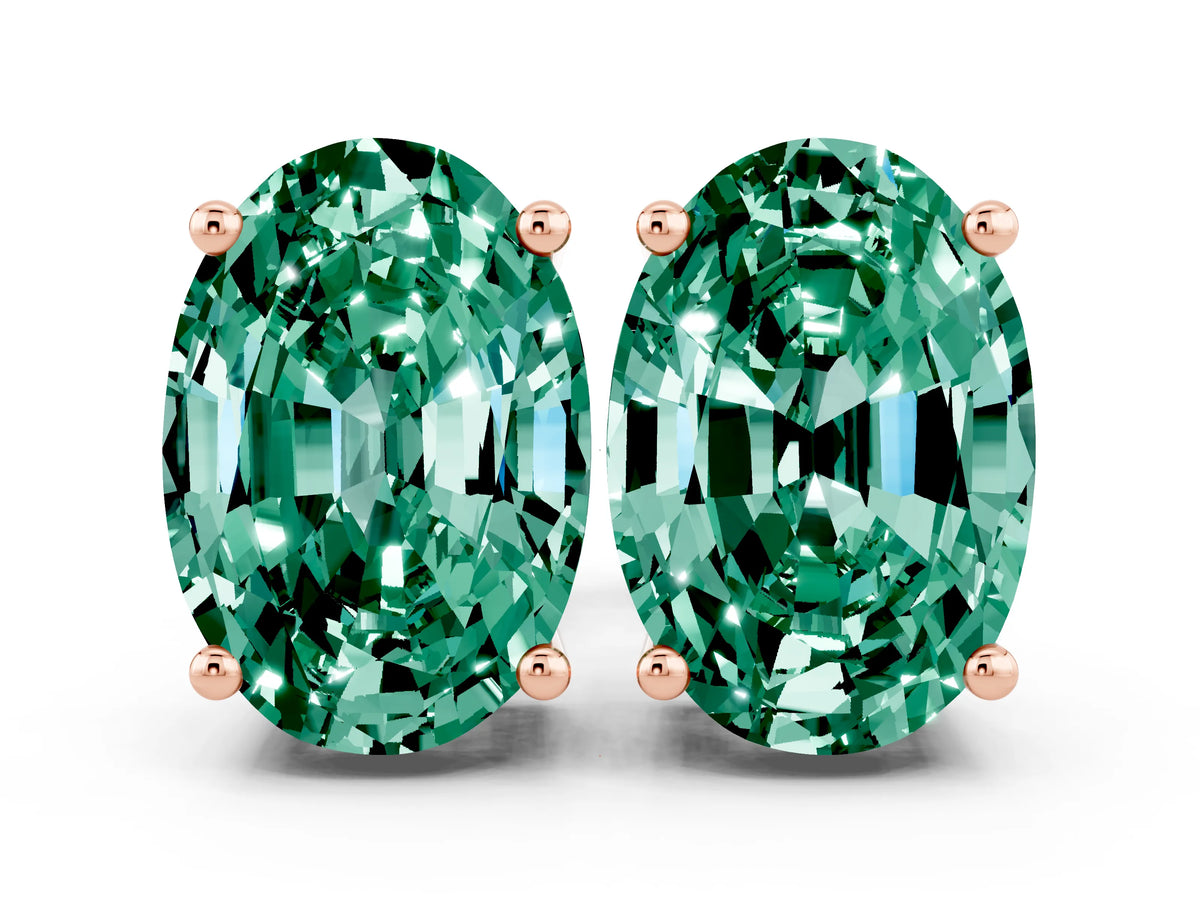Oval Cut Green Sapphire Stud Earrings in Rose gold with Basket Setting