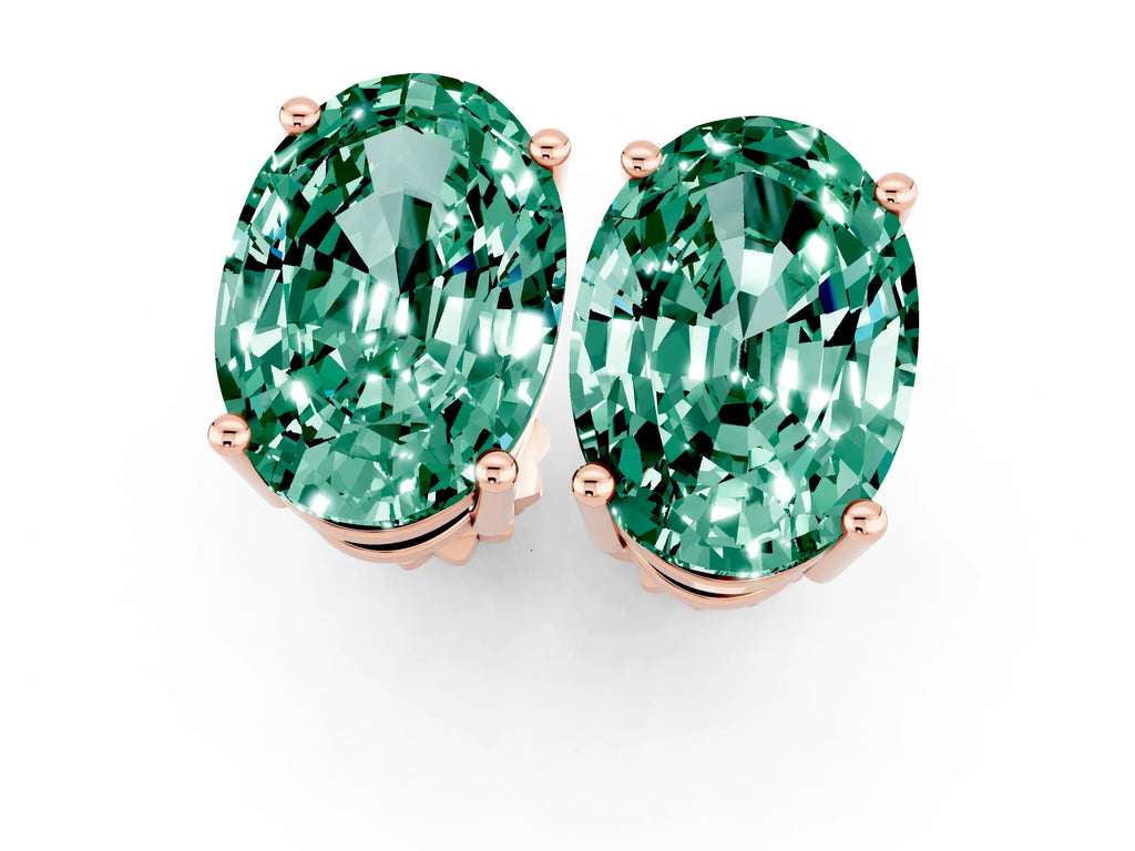 Oval Cut Green Sapphire Stud Earrings in Rose gold with Basket Setting
