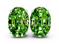 Oval Cut Peridot Stud Earrings in Silver with Basket Setting