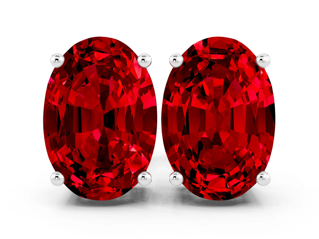 Oval Cut Ruby Stud Earrings in Platinum with Basket Setting
