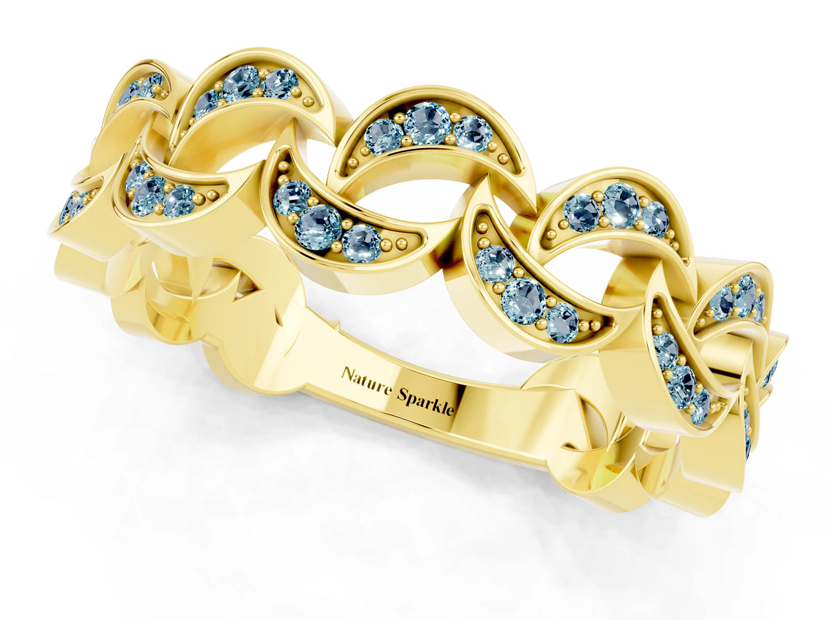 Pavé Round Aquamarine Interlocking Eternity Band in Yellow gold with Bezel Prong Setting