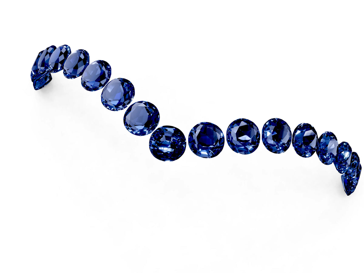 Pavé Round Blue Sapphire Chevron Band in Platinum with Shared Prong Setting