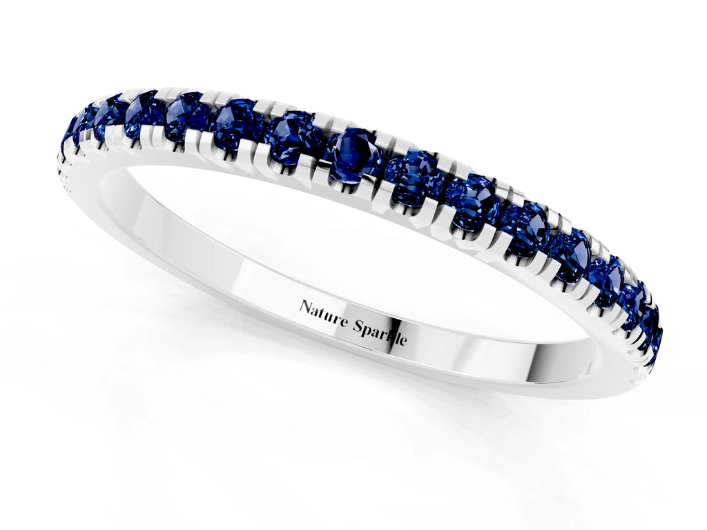 Pavé Round Blue Sapphire Half Eternity Band in Silver with Shared Prong Setting