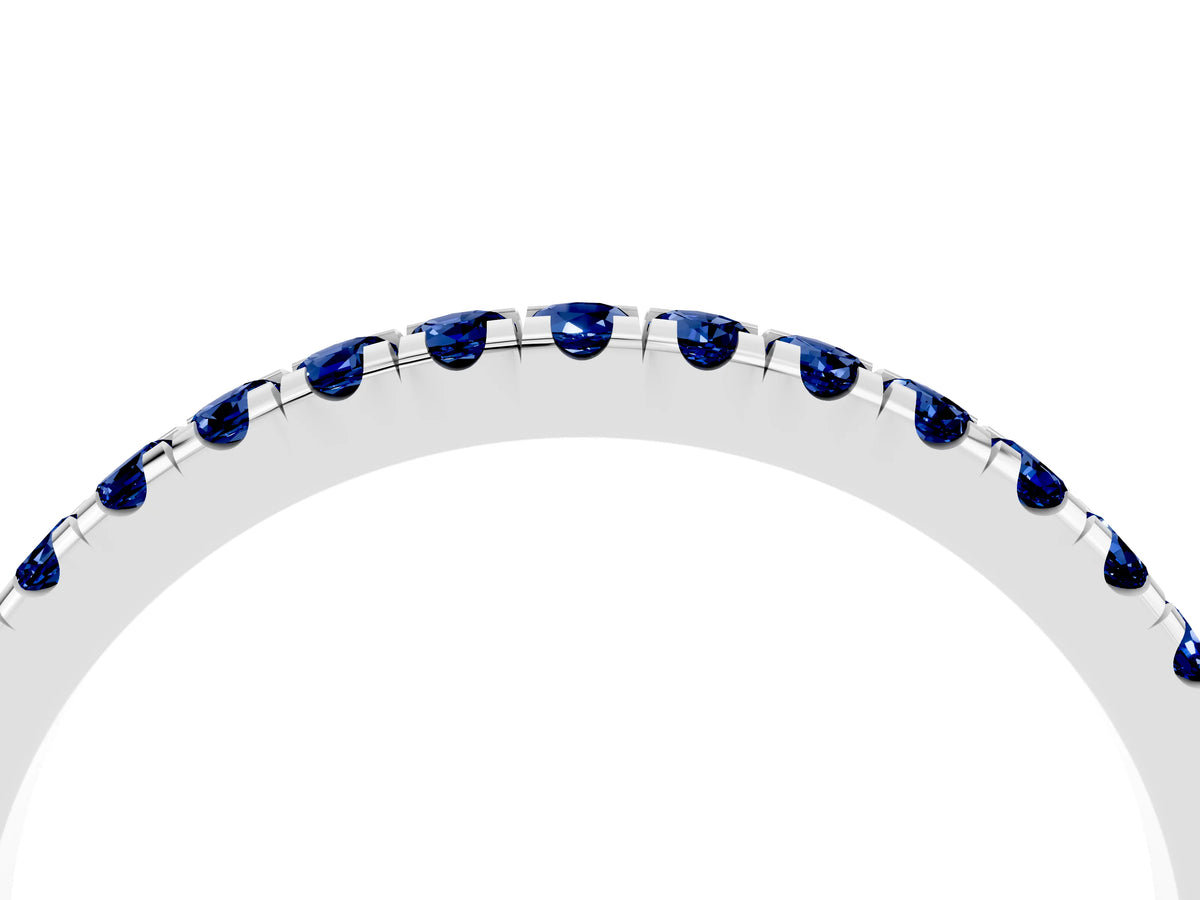 Pavé Round Blue Sapphire Half Eternity Band in Silver with Shared Prong Setting