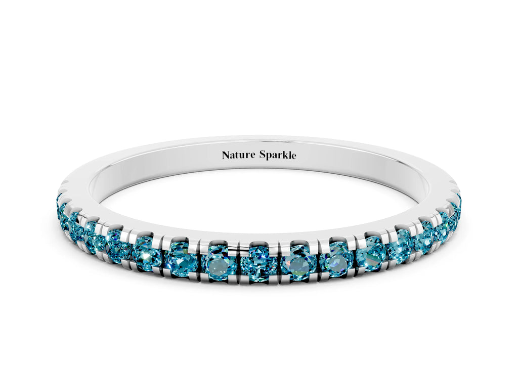 Pavé Round Blue Topaz Half Eternity Band in Silver with Shared Prong Setting