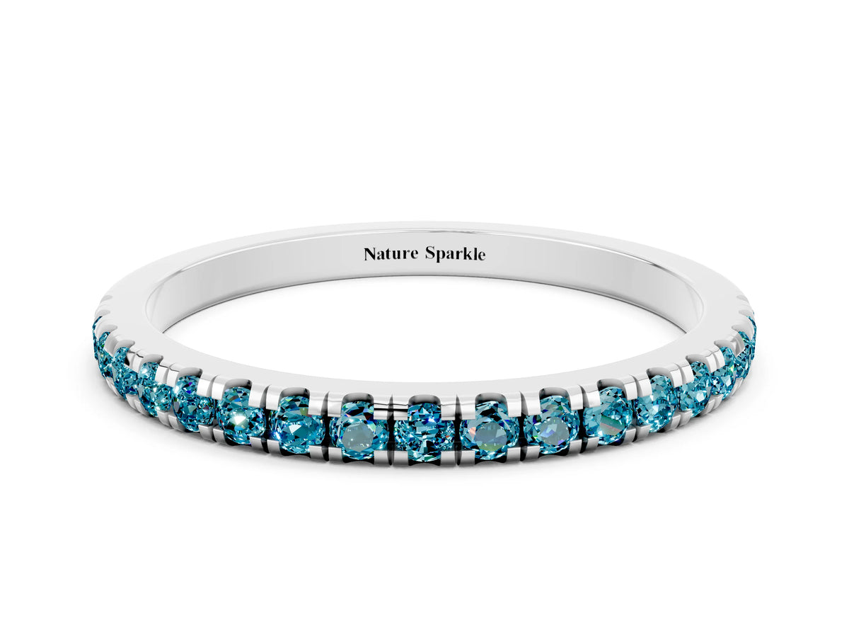 Pavé Round Blue Topaz Half Eternity Band in Silver with Shared Prong Setting