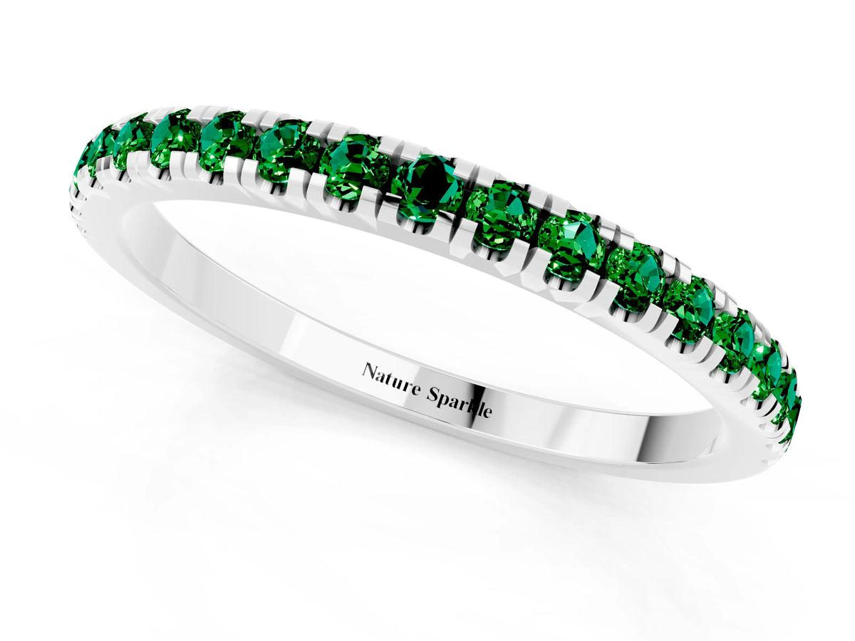 Pavé Round Emerald Half Eternity Band in Silver with Shared Prong Setting