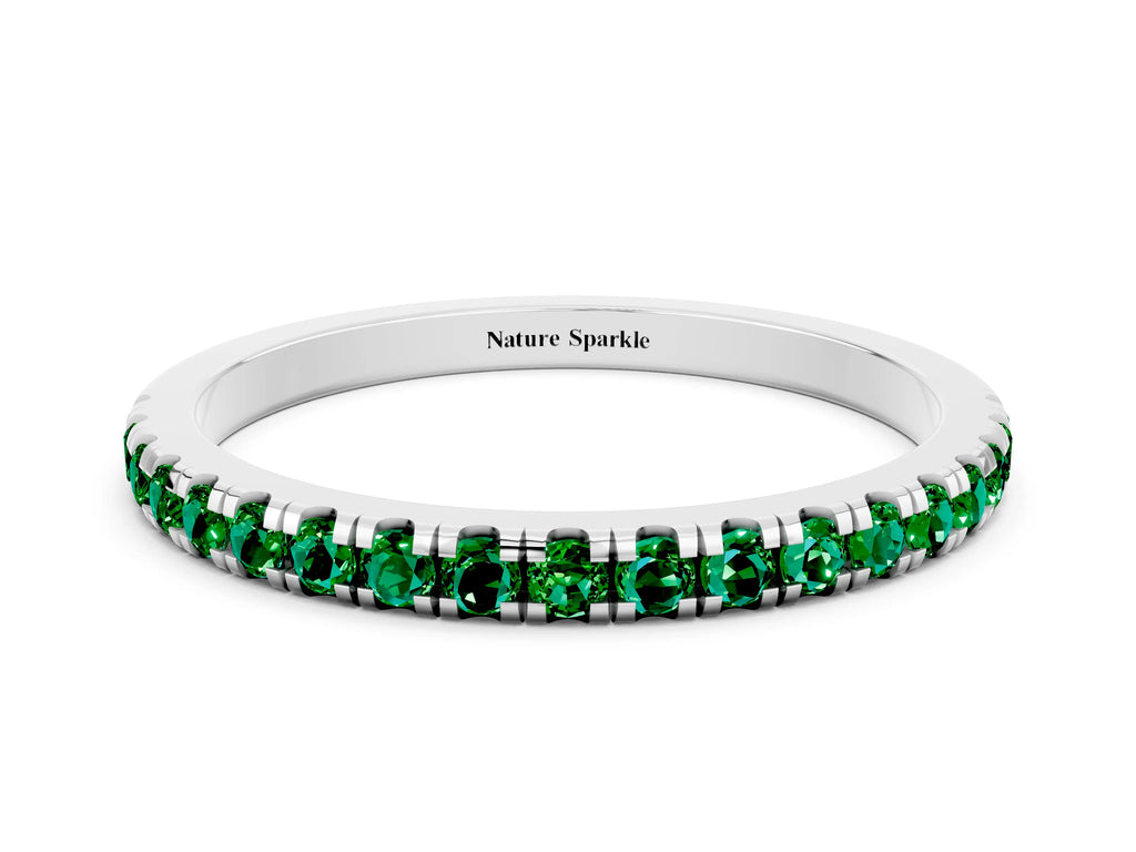 Pavé Round Emerald Half Eternity Band in White gold with Shared Prong Setting