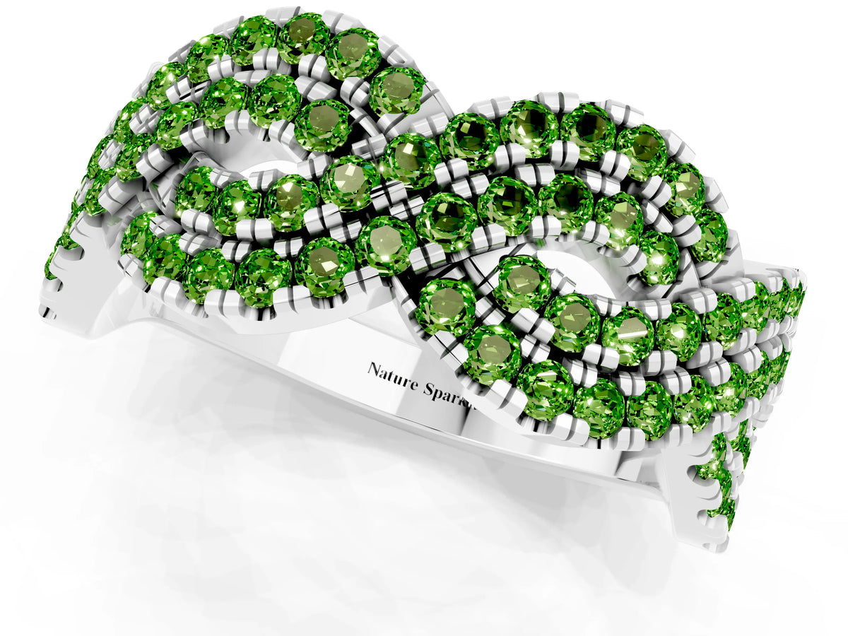 Pavé Round Peridot Infinity Twist Band in White gold with Shared Prong Setting