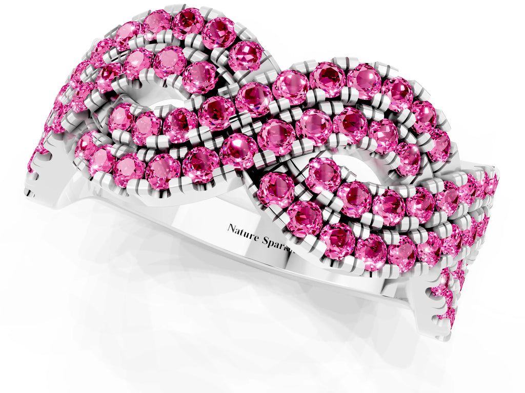 Pavé Round Pink Sapphire Infinity Twist Band in Silver with Shared Prong Setting
