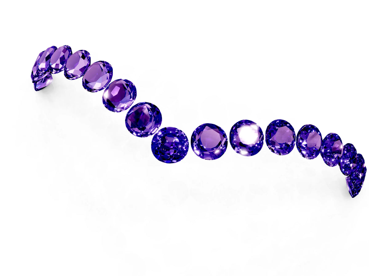 Pavé Round Tanzanite Chevron Band in White gold with Shared Prong Setting