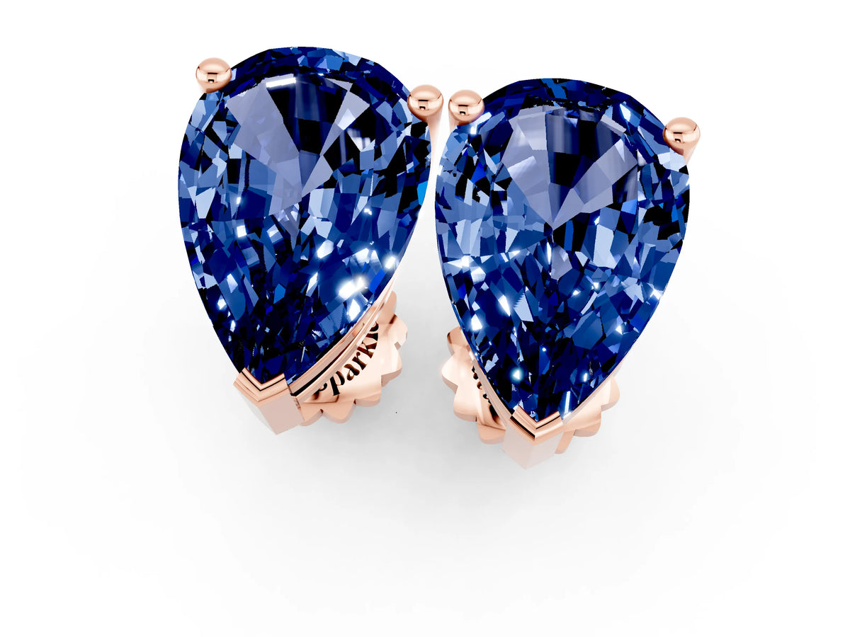 Pear Cut Blue Sapphire Stud Earrings in Rose gold with Basket Setting