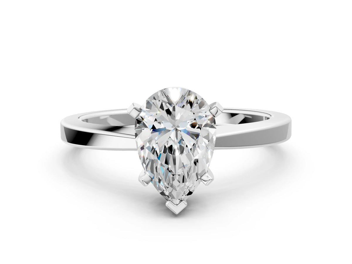 Pear Cut Diamond Solitaire Engagement Ring in Silver with Prong Setting