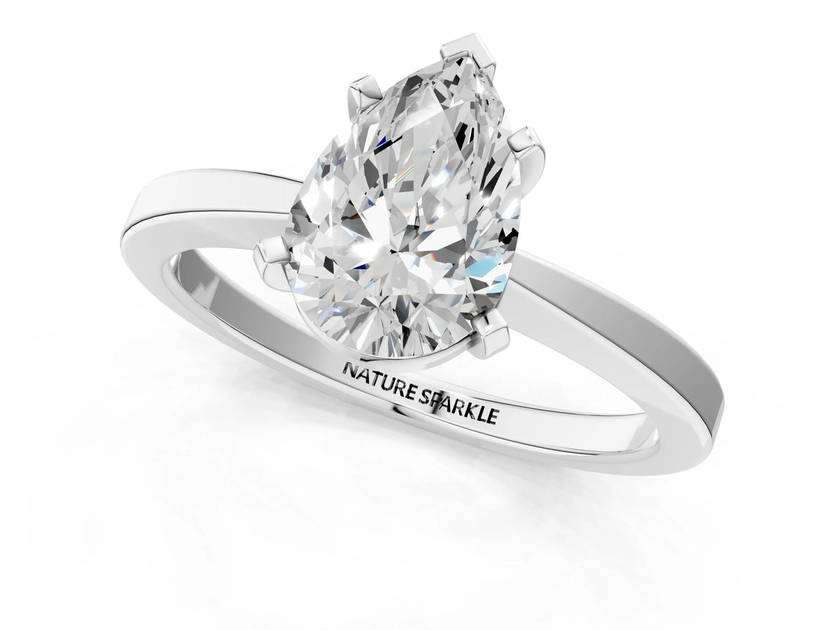 Pear Cut Diamond Solitaire Engagement Ring in Silver with Prong Setting