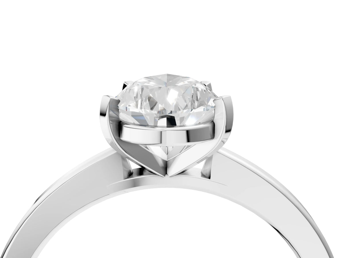 Pear Cut Diamond Solitaire Engagement Ring in Platinum with Prong Setting