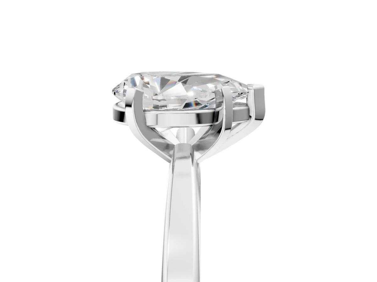 Pear Cut Diamond Solitaire Engagement Ring in Platinum with Prong Setting