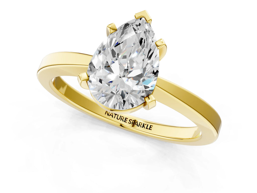 Pear Cut Diamond Solitaire Engagement Ring in Yellow gold with Prong Setting