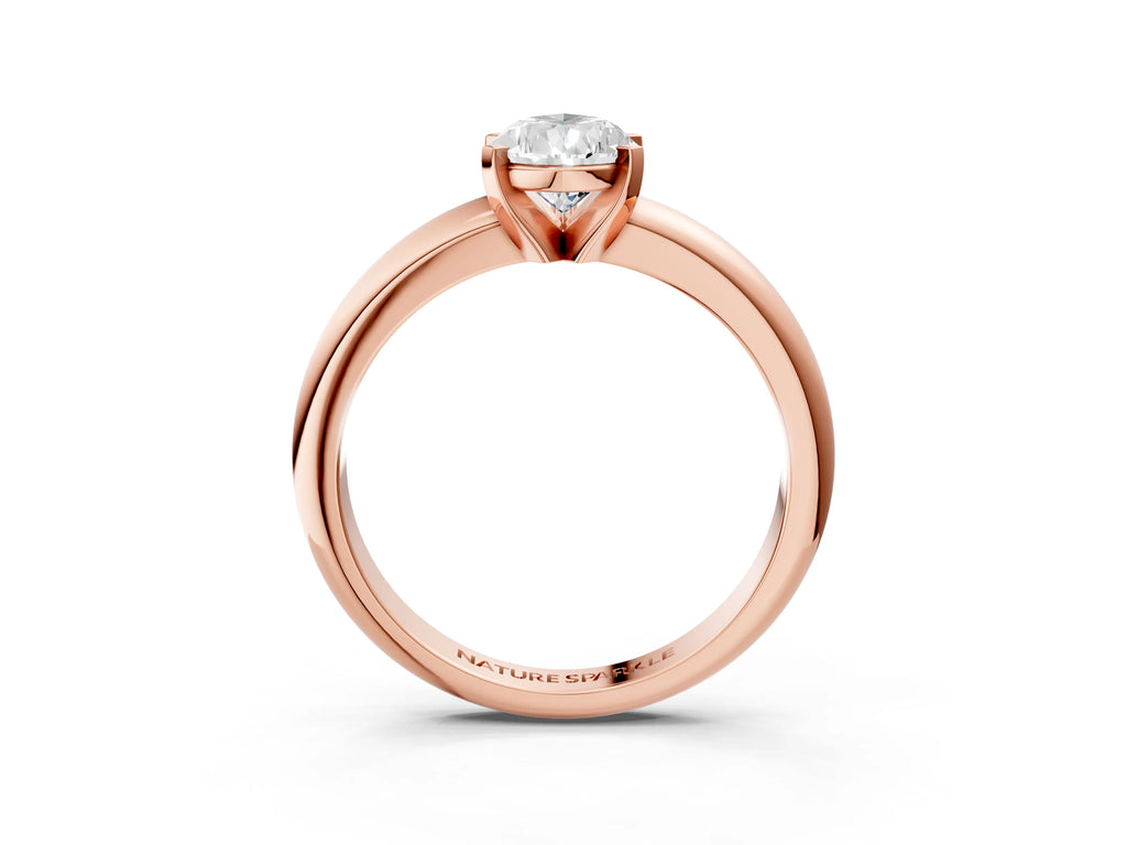 Pear Cut Diamond Solitaire Ring in Rose gold with Prong Setting and Rounded Band