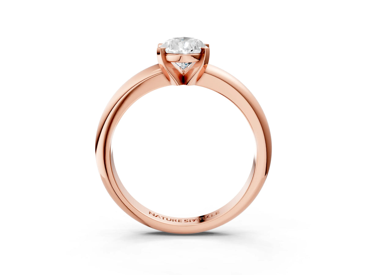 Pear Cut Diamond Solitaire Ring in Rose gold with Prong Setting and Rounded Band