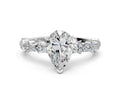 Pear Cut Diamond Solitaire Ring in Silver with Pear and Round Cluster Band
