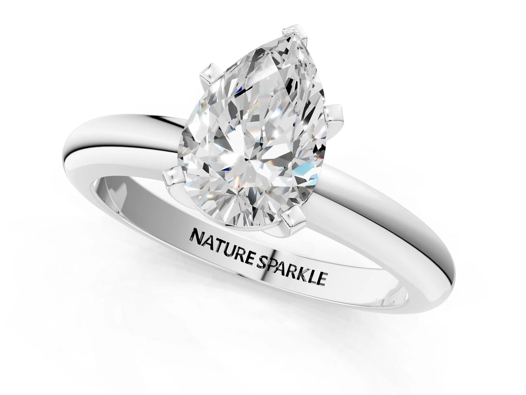 Pear Cut Diamond Solitaire Ring in Platinum with Prong Setting and Rounded Band