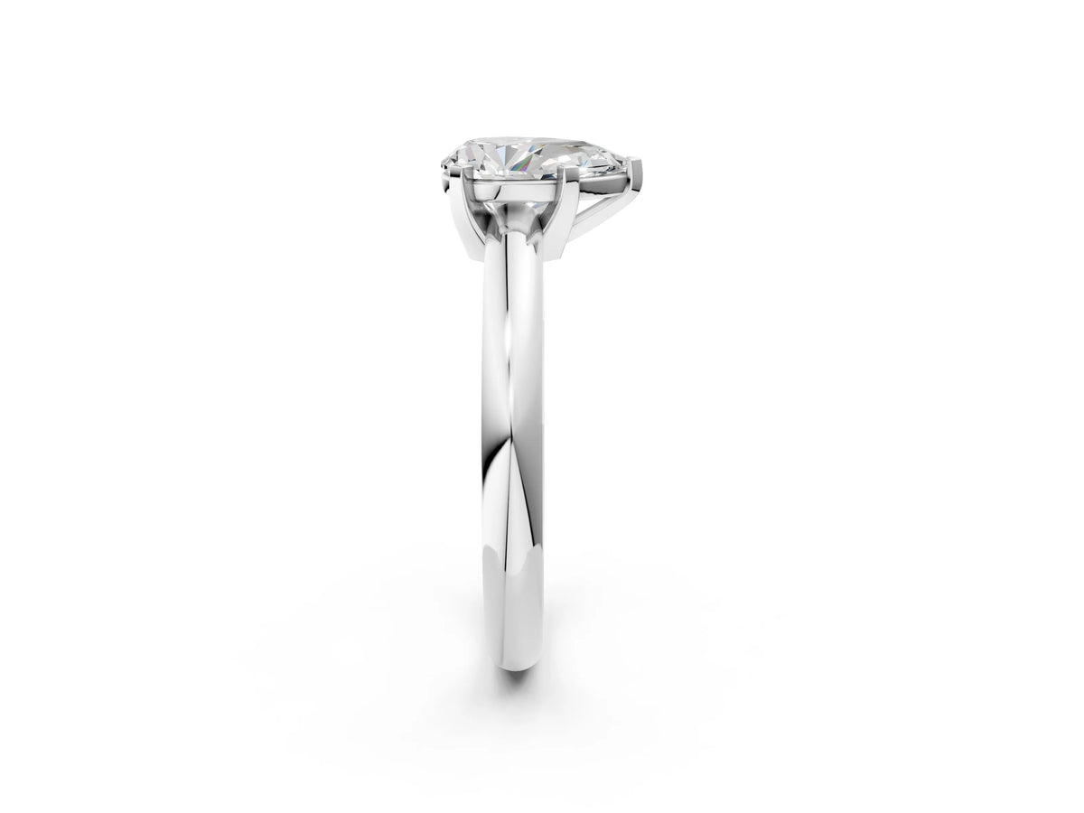 Pear Cut Diamond Solitaire Ring in Silver with Prong Setting and Rounded Band