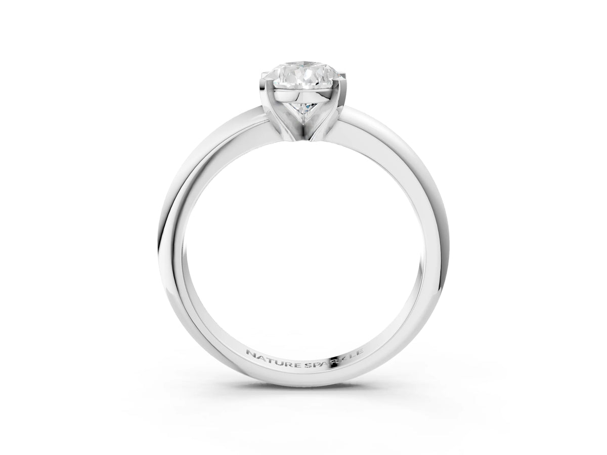 Pear Cut Diamond Solitaire Ring in Silver with Prong Setting and Rounded Band