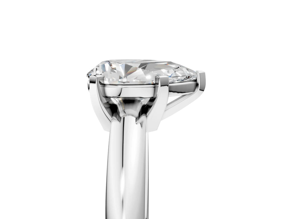 Pear Cut Diamond Solitaire Ring in Platinum with Prong Setting and Rounded Band