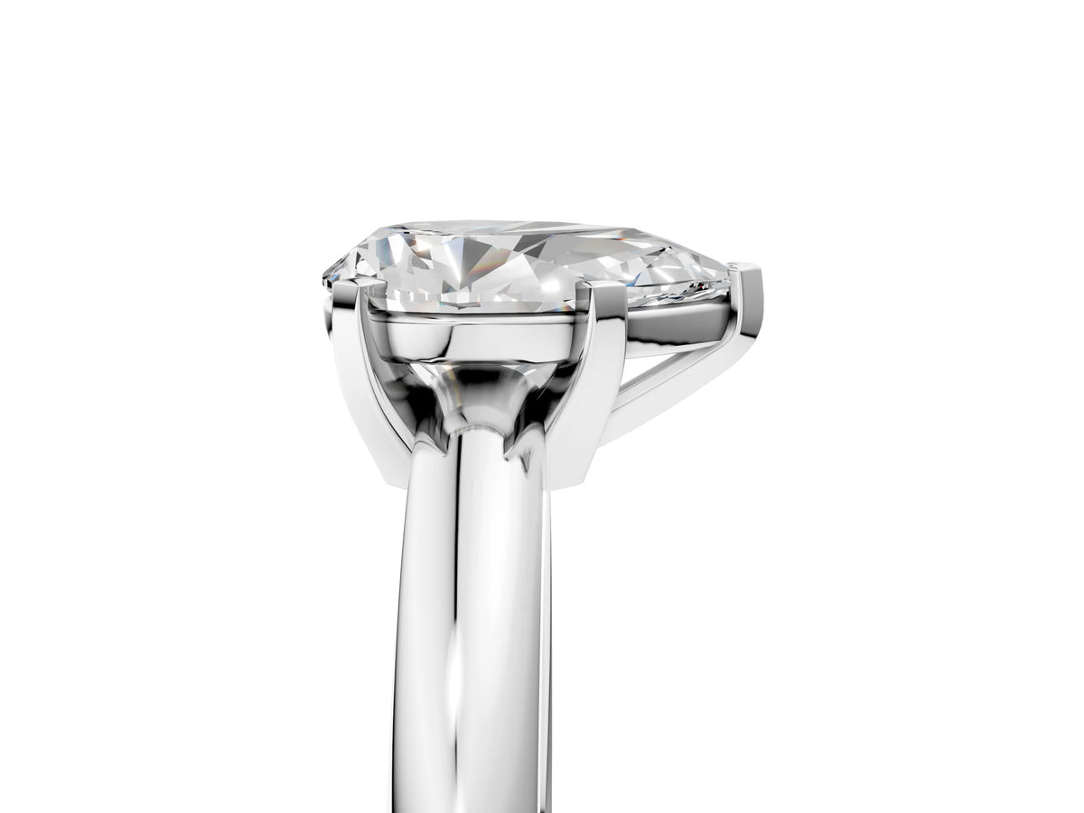 Pear Cut Diamond Solitaire Ring in Platinum with Prong Setting and Rounded Band