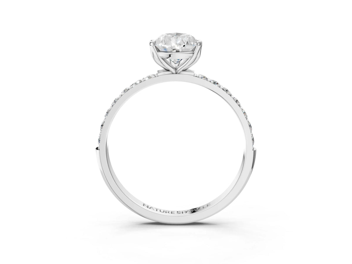 Pear Cut Diamond Solitaire Ring in Silver with Round Shared Prong Pavé Band