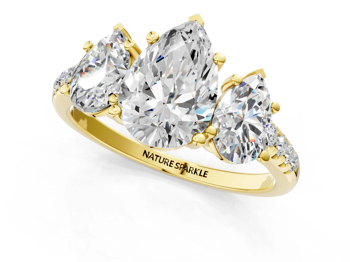 Pear Cut Diamond Trellis Three-Stone Engagement Ring in Yellow gold with Round Side Stones