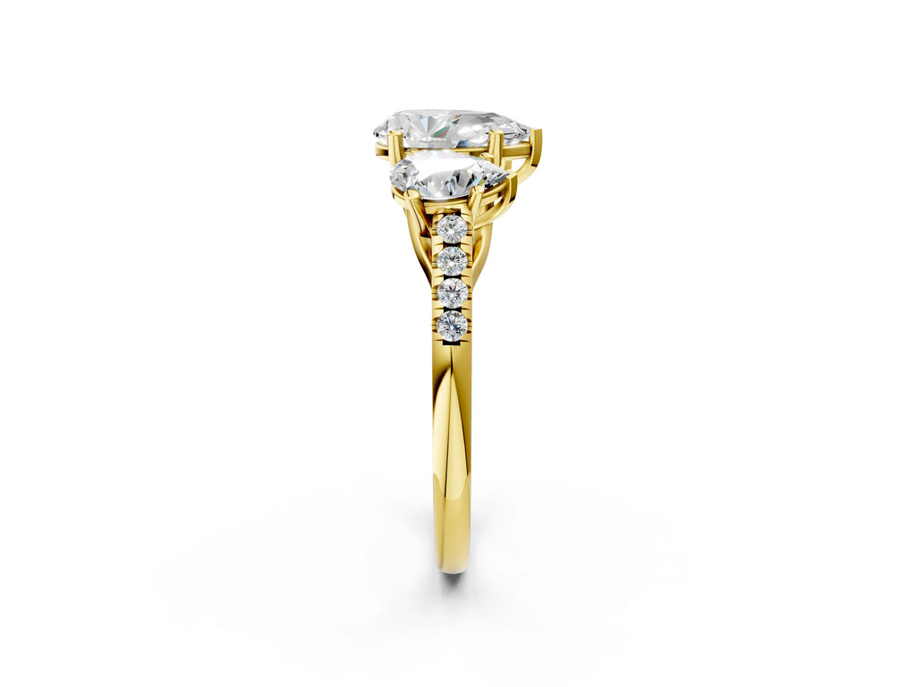 Pear Cut Diamond Trellis Three-Stone Engagement Ring in Yellow gold with Round Side Stones