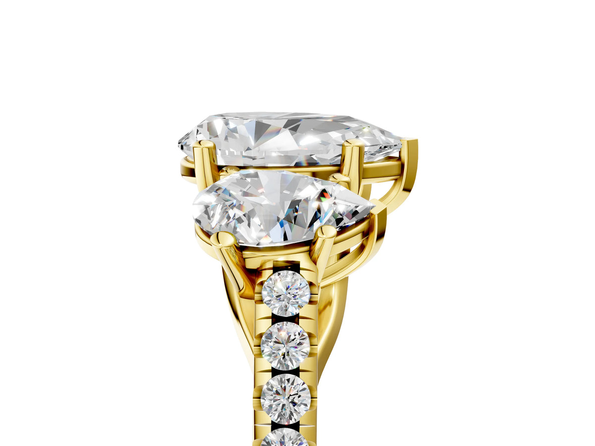 Pear Cut Diamond Trellis Three-Stone Engagement Ring in Yellow gold with Round Side Stones