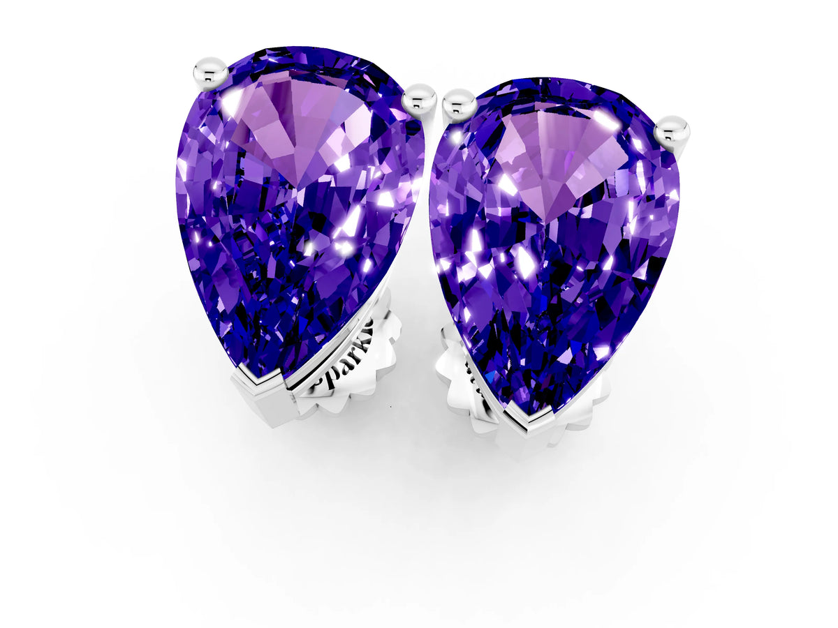 Pear Cut Tanzanite Stud Earrings in Silver with Basket Setting