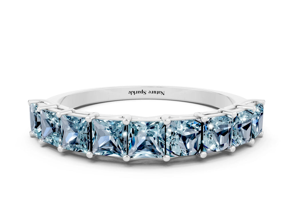 Princess Cut Aquamarine Eternity Band in Platinum with Channel Setting and Prong Detail