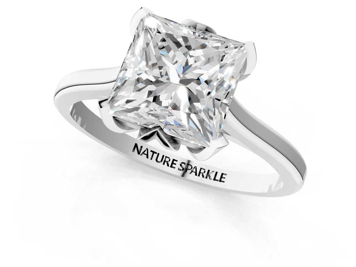 Princess Cut Diamond Solitaire Ring in Platinum with Flower Prong Setting