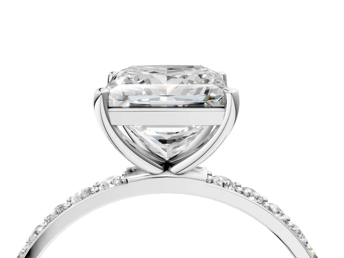 Princess Cut Diamond Solitaire Ring in Platinum with Round Pavé Band
