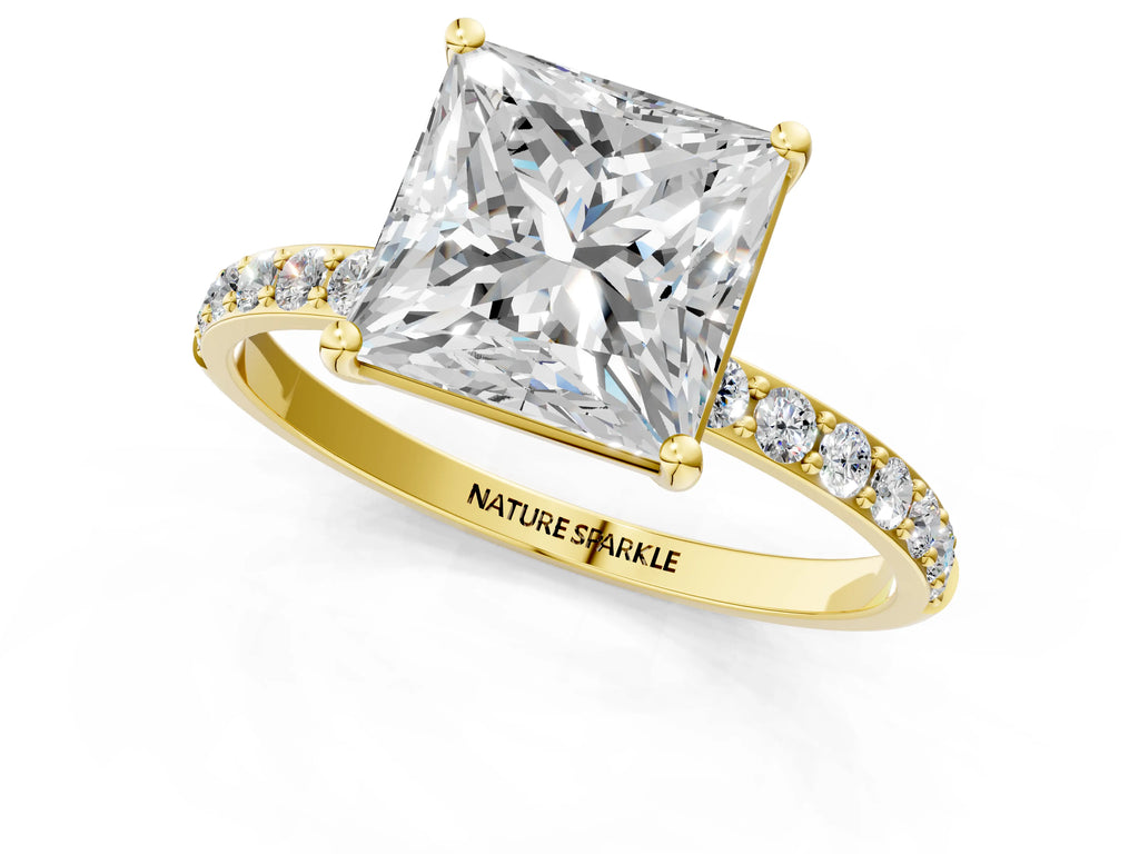 Princess Cut Diamond Solitaire Ring in Yellow gold with Round Pavé Band