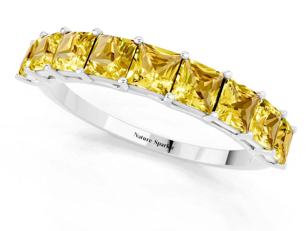 Princess Cut Yellow Sapphire Eternity Band in Platinum with Channel Setting and Prong Detail