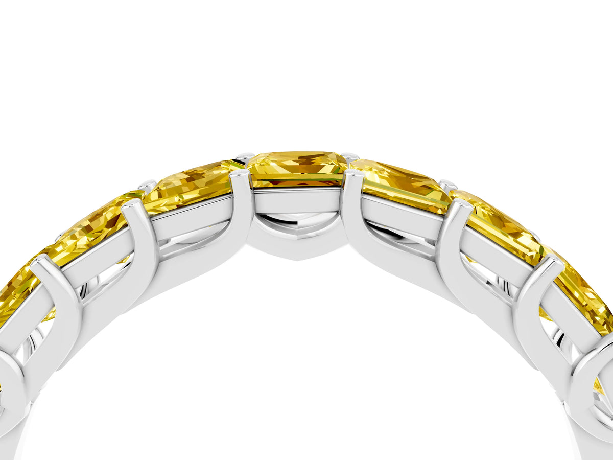 Princess Cut Yellow Sapphire Eternity Band in Platinum with Channel Setting and Prong Detail