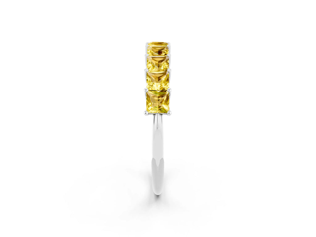 Princess Cut Yellow Sapphire Eternity Band in Silver with Channel Setting and Prong Detail